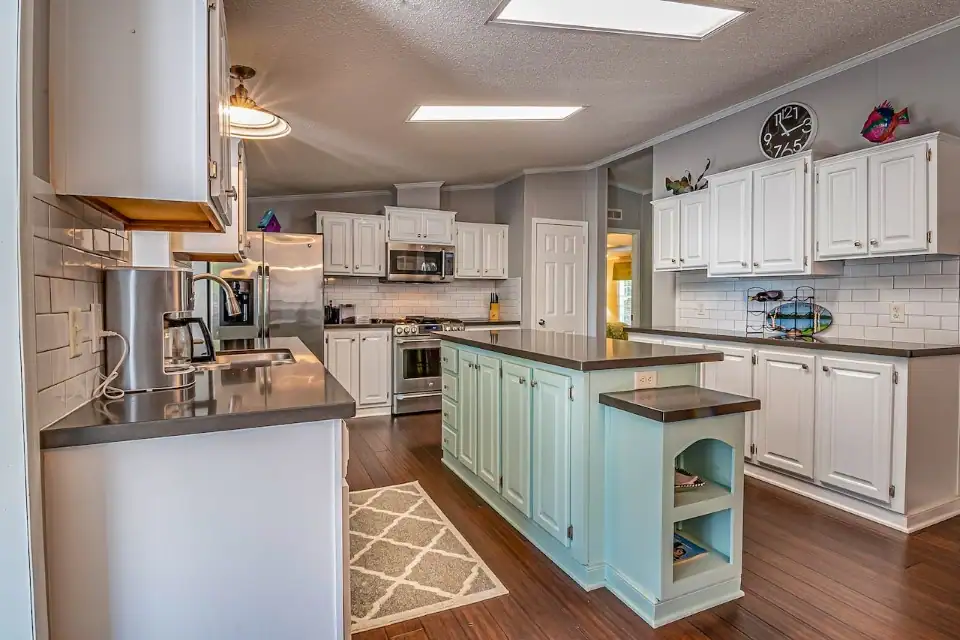 light grey cabinets with butcher block countertops